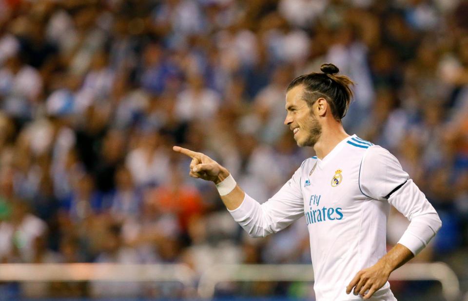 Gaya Gareth Bale usai membobol gawang Deportivo La Coruna di Pekan I Liga Spanyol dini hari tadi