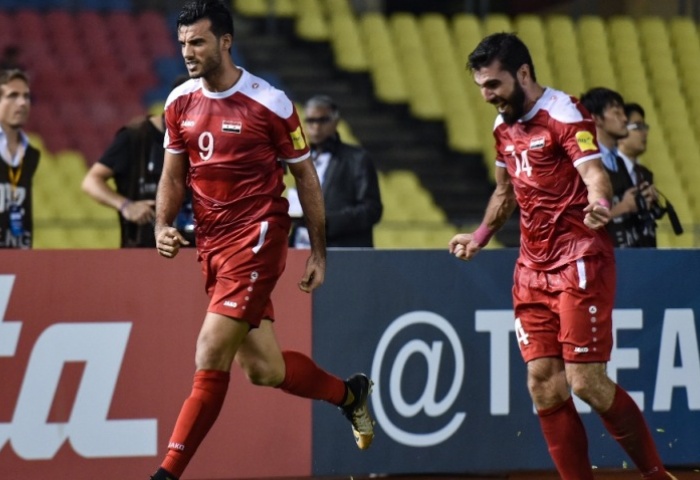 Ekspresi pemain Suriah Al Somah usai mencetak gol ke gawang Australia dalam babak playoff Piala Dunia 2018. 