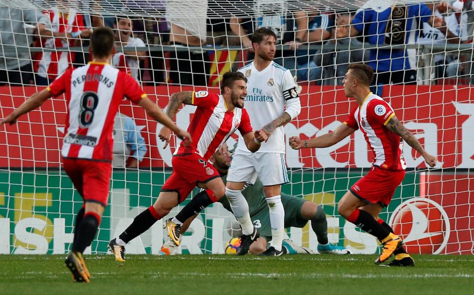 Pemain Girona Portu mencetak gol kemenangan atas Real Madrid, dinihari tadi. foto:reuters