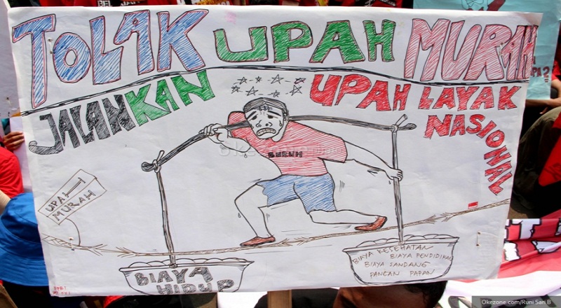 Ilustrasi unjuk rasa buruh menolak upah murah