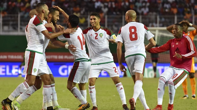 Pemain Maroko bergembira usai memastikan satu tiket ke Piala Dunia 2018 Rusia, dini hari tadi. 