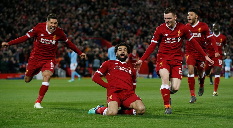 Selebrasi Mohamed Salah usai mencetak gol pembuka di gawang Man City. foto;reuters