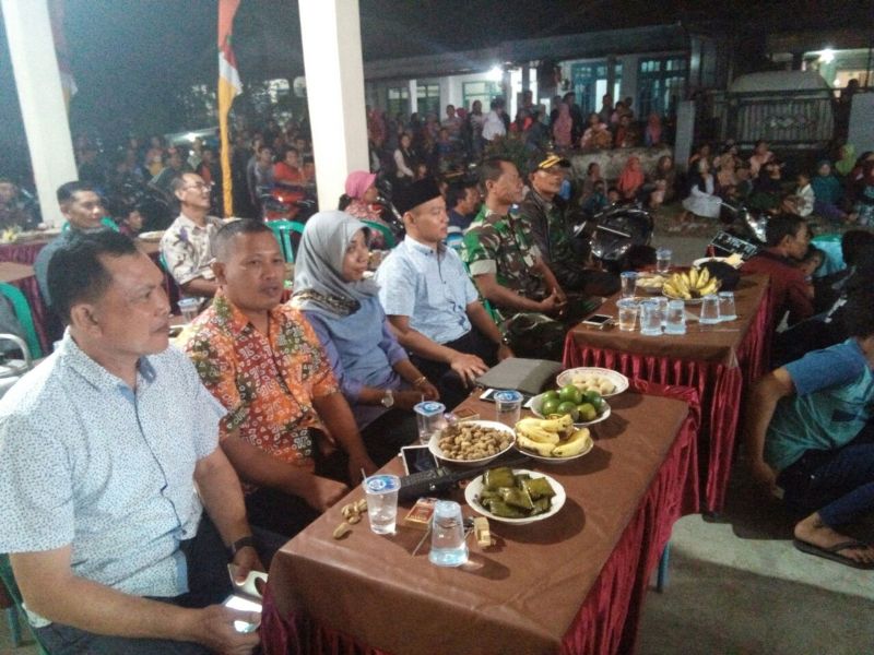 Danramil 0815/13 Bersama Kapolsek Kutorejo AKP Putu Sadia dan Kades Kepuh Pandak Ana Yuliana, SE Di Acara Ruwah Dusun