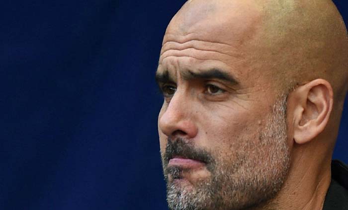 Pelatih Manchester City, Pep Guardiola, memperpanjang kontrak hingga 2021. (foto: goal.com)