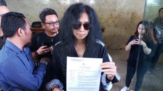 John Paul Ivan melaporkan pimpinan situs www.pribuminews.co.id ke Bareskrim terkait lagu #2019GantiPresiden.