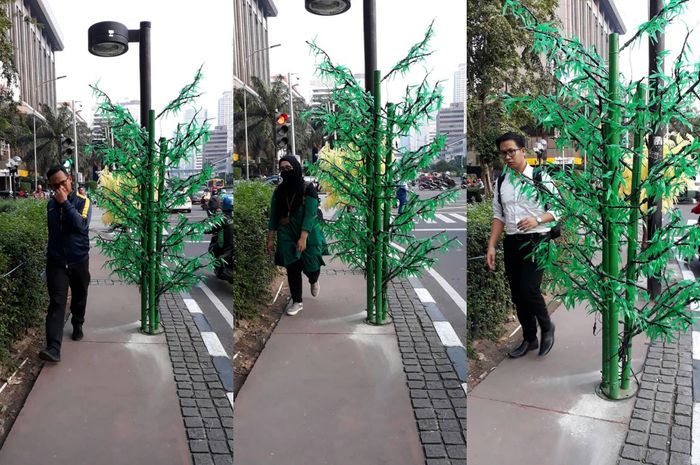 Letak pohon imitasi mengganggu pejalan kakai.