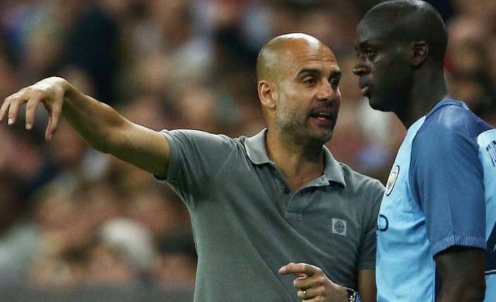  Pep Guardiola dan Yaya Toure ketika masih bermain di Manchester City. (foto: star africa)