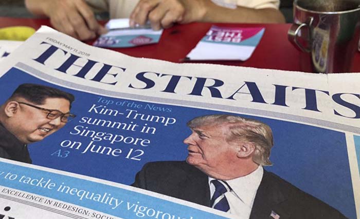 Media ekspos pertemuan Donald Trump - Kim Jong-Un di Singapura. (foto: sputnik international)