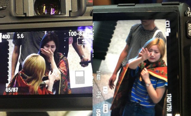 Member TWICE tengah menangis di bandara. (Kolase)