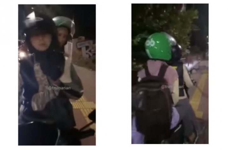 Aksi pengemudi ojek online (ojol) lewat trotoar yang terekam kamera pejalan kaki.