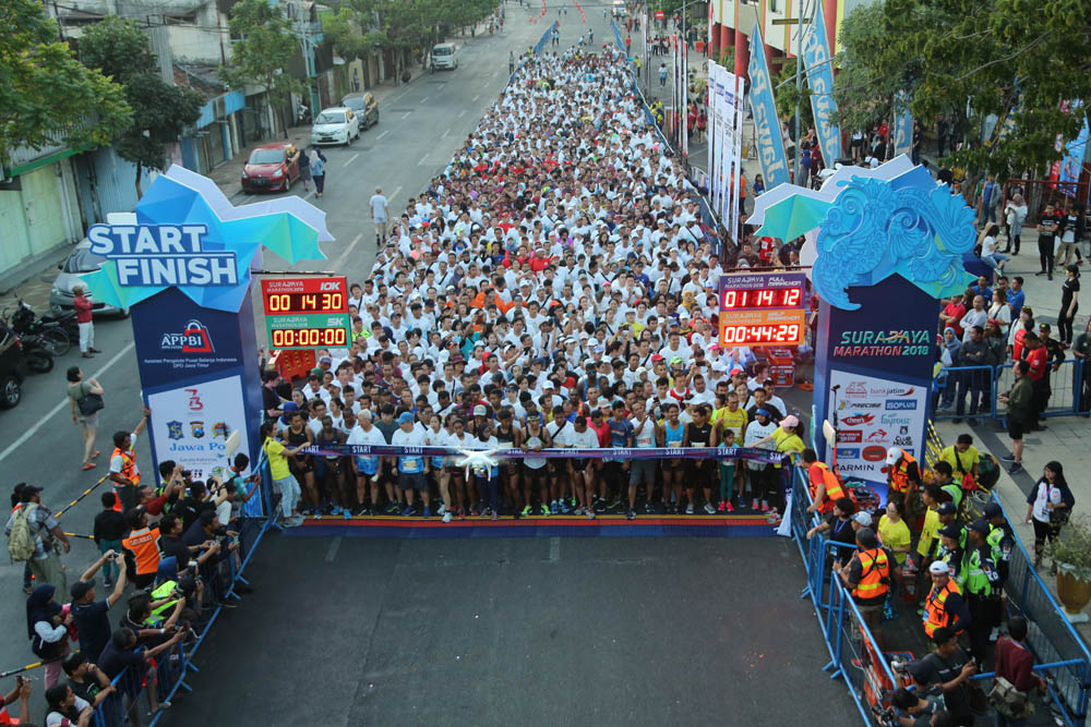 Kejuaraan Surabaya Marathon 2018, di Embong Malang, Surabaya, Minggu 12 Agustus 2018. 