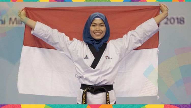 Defia Rosmaniar menyabet emas di laga nomor individual Poomsae.