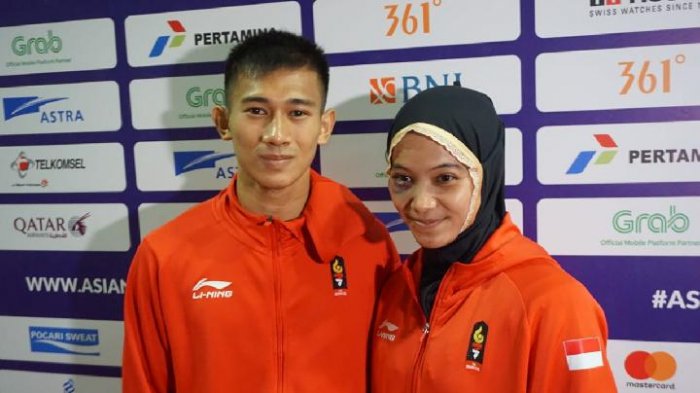 Pasangan suami istri sekaligus atlet pencak silat, Iqbal Candra Pratama dan Sarah Tria Monita. 