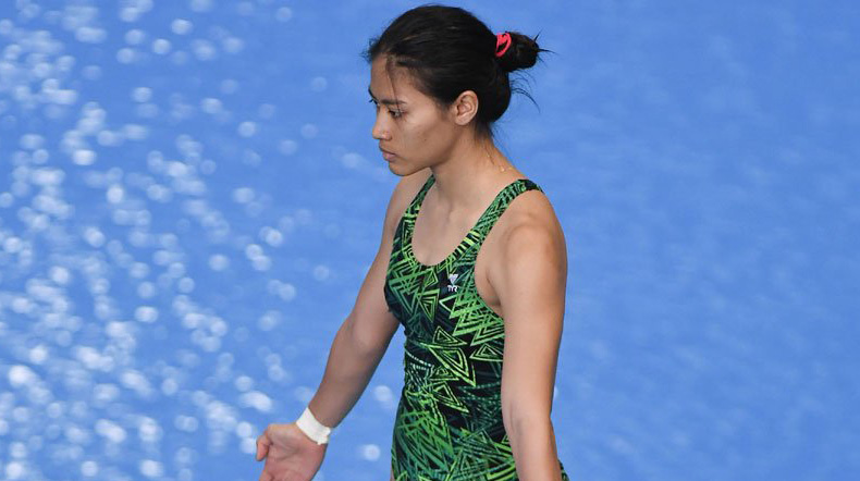 Atlet loncat indah Indonesia Maria Natalie Dinda Anasti bersiap beraksi dalam penyisihan Loncat Indah Putri 3 meter Springboard Asian Games Ke-18 Tahun 2018 di Aquatic Centre GBK, Senayan, Jakarta, Sabtu (1/9/2018). (Foto: Antara/INASGOC/Rosa Panggabean)