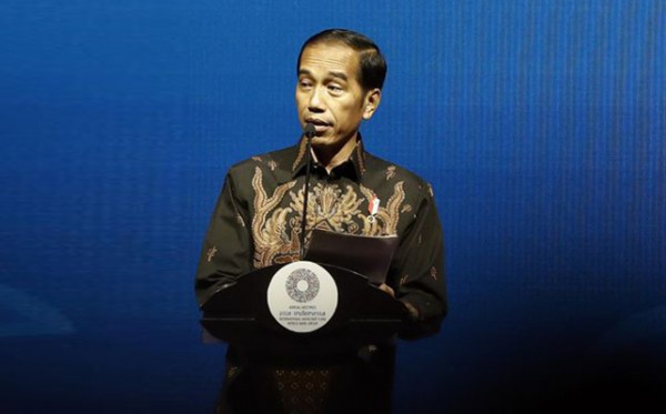 Presiden Joko Widodo saat memberikan sambutan dalam acara The Bali Fintech Agenda IMF–WB 2018 di Nusa Dua, Bali.