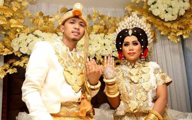 Evi Masamba dan suaminya, Arief Hajrianto.