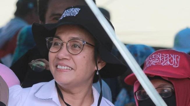 Topi bertuliskan kalimat Tauhid yang dipakai Menteri Keuangan Sri Mulyani jadi sorotan.