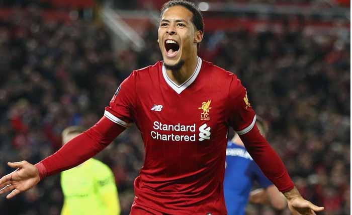 Virgil van Dijk usai mencetak gol ke gawang Wolverhampton, Sabtu dini hari. (Foto: AFP)