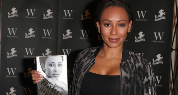 Melanie Brown, atau lebih dikenal dengan nama Mel B 'Spice Girls' memegang buku barunya, Brutally Honesy. (Foto: Irish Times).