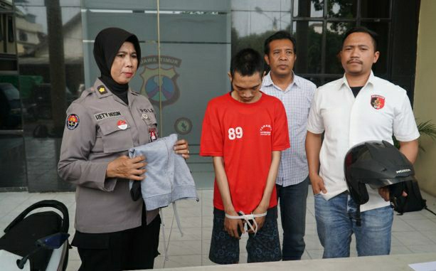Pelaku saat di Mapolrestabes Surabaya (Foto : Istimewa)
