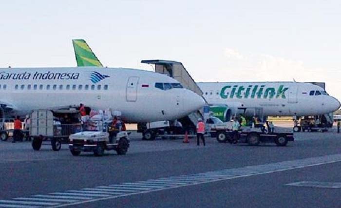 Pesawat  Garuda Indonesia dan Citilink di Bandara Juanda. (Foto:Dok.Ngobar)