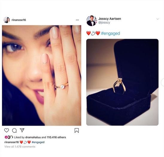 Foto tersebut fokus pada cincin berwarna emas dengan batu permata di atasnya.