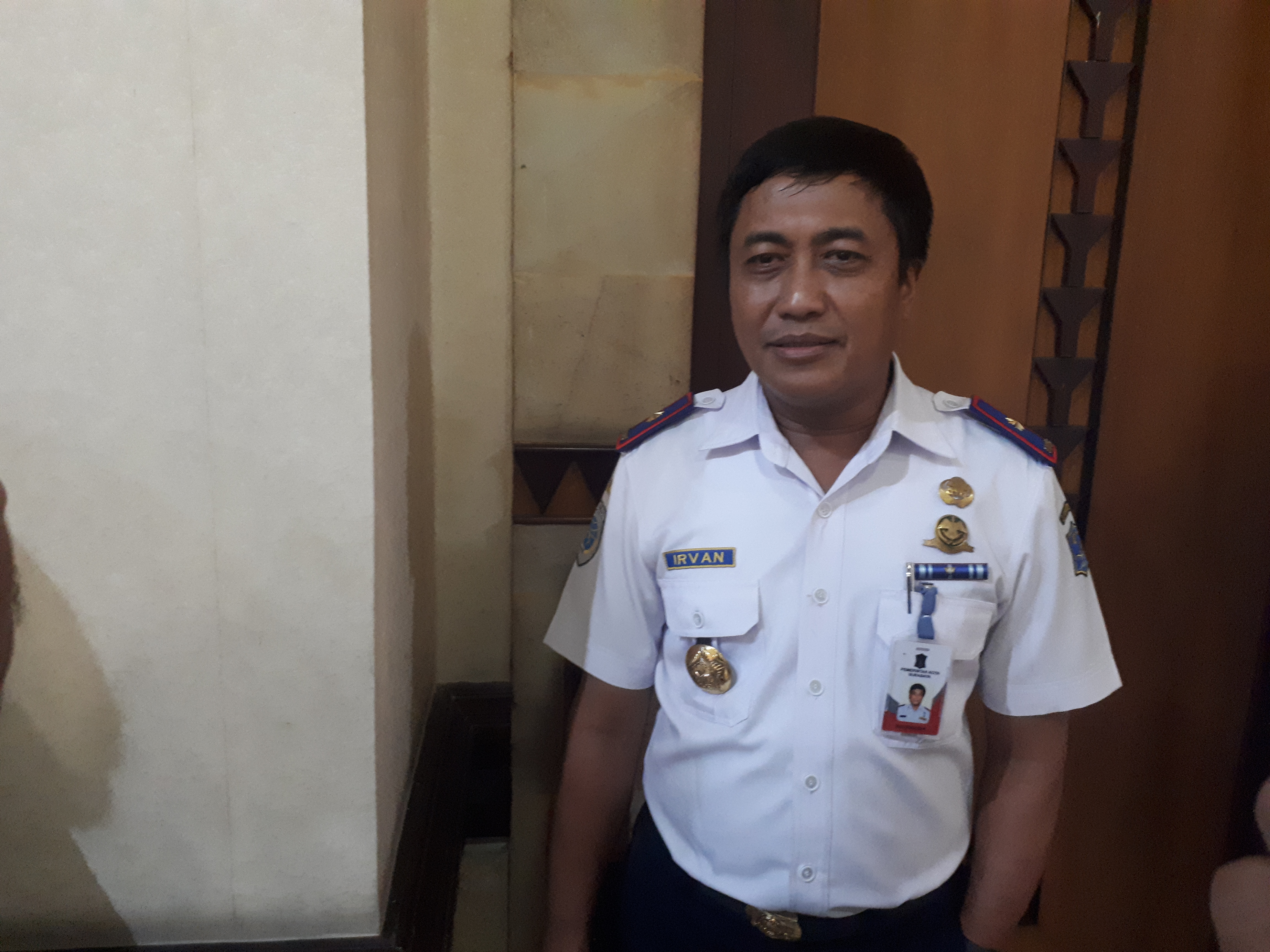 Irvan disela-sela rapat paripurna dengan DPRD Kota Surabaya. (Foto: Alief/ngopibareng.id)