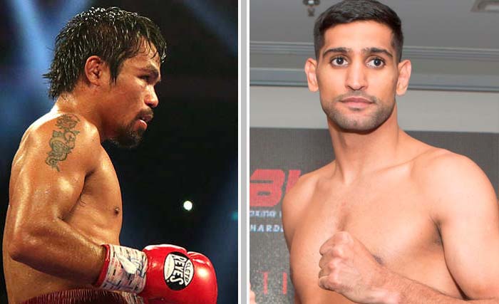 Manny Pacquiao (petinju Filipina) dan Amir Khan (Inggris). (Foto:Ngobar/afp)