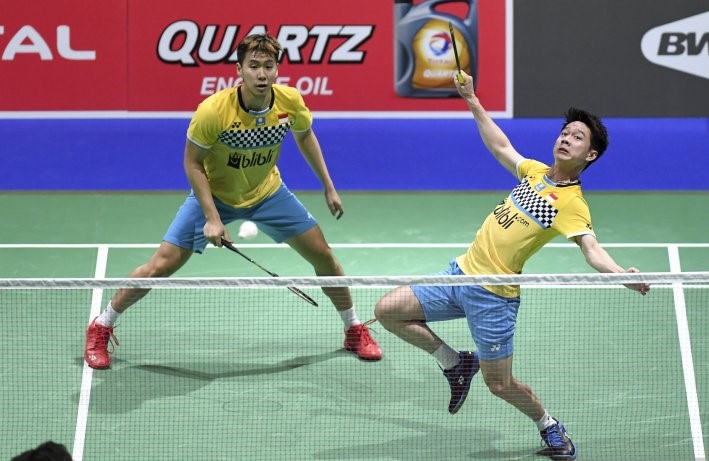 Ganda putra Indonesia Kevin Sanjaya Sukamuljo (kanan) dan Marcus Fernaldi Gideon di Kejuaraan Dunia Bulutangkis 2019 di Basel, Swiss. (Foto: Ant)