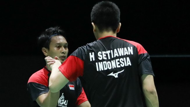 Pasangan ganda Hendra/Ahsan melaju ke perempat final setelah menumbangkan pasangan Skotlandia, Kamis, 22 Agustus 2019. (Foto: PBSI)