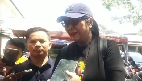 Tri Susanti ditahan di Polda Jatim. (Foto: Haris/ngopibareng.id)