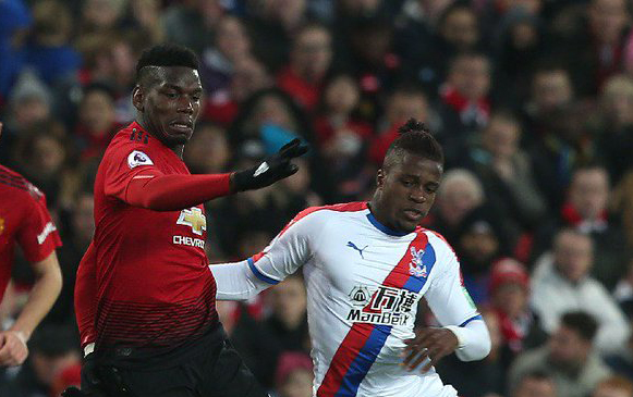 Neville jelaskan alasan Paul Pogba jadi sasaran kritik. (Foto: Twitter/@