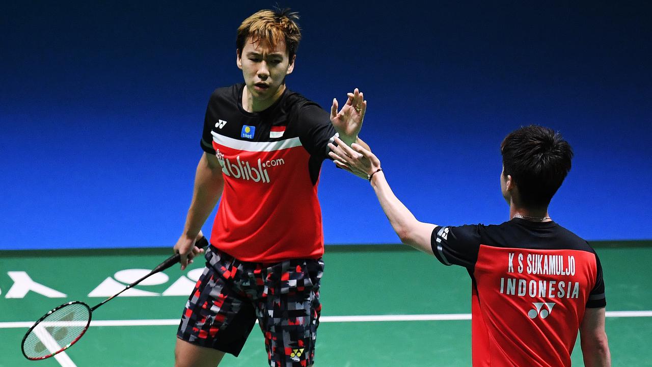 Ganda Kevin/Marcus melaju ke babak kedua China Open 2019 setelah mengalahkan  ganda Jepang Takuro Hoki/Yugo Kobayashi dengan skor 21-17 dan 21-15. (Foto: AFP)