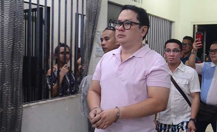 David Navarro, ketika digiring ke tahanan hari Kamis lalu, sehari sebelum dia ditembak. (Foto:Sunstar)