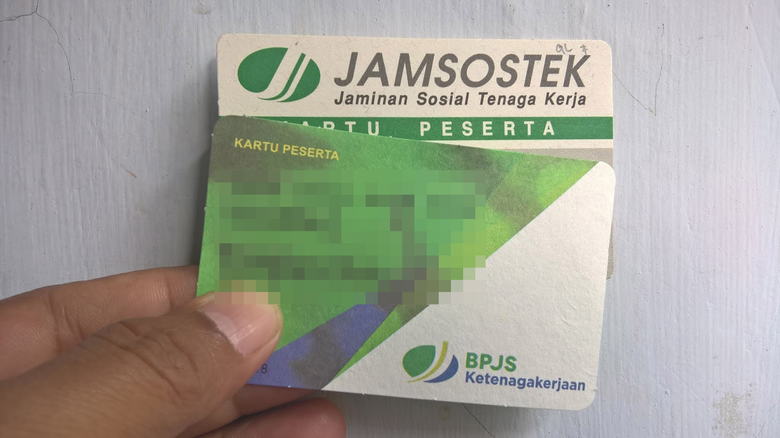 Ilustrasi kartu Jamsostek dan BPJS Ketenagakerjaan. (Foto: Istimewa)