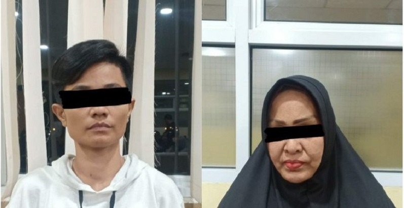 ibu dan anak diduga otak bisnis prostitusi yang ditahan jaksa. (Foto: Antara) 