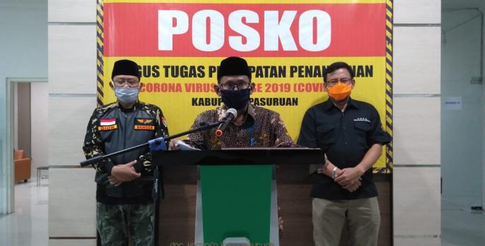 Juru Bicara Gugus Tugas Percepatan Penanganan Covid-19 Kabupaten Pasuruan, Anang Saiful Wijaya dalam konferensi pers, Selasa, 21 April 2020. (Foto: Dok Humas)