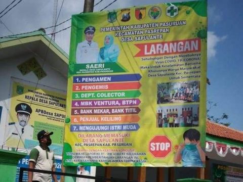 Baliho larangan kunjungi istri muda di salah satu desa di Pasuruan. (Foto: Istimewa)