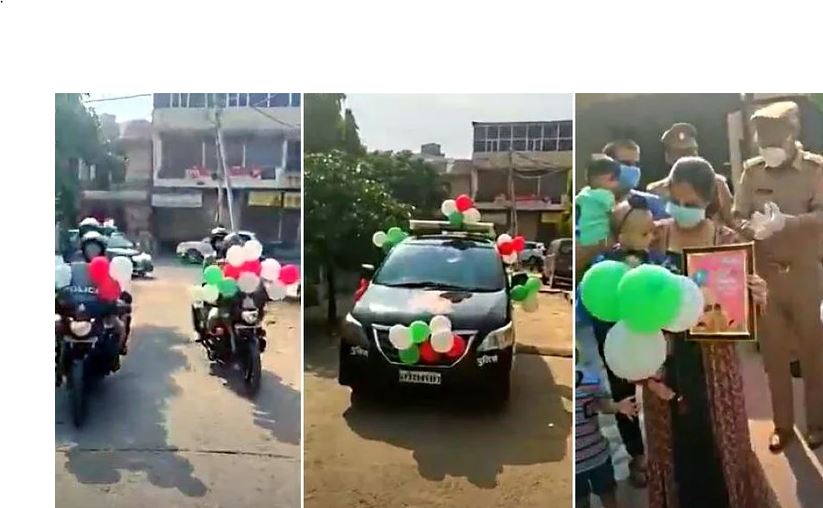 Sejumlah polisi India melakukan konvoi perayaan ulang tahun pertama seorang bayi. (Foto: Cartoq)