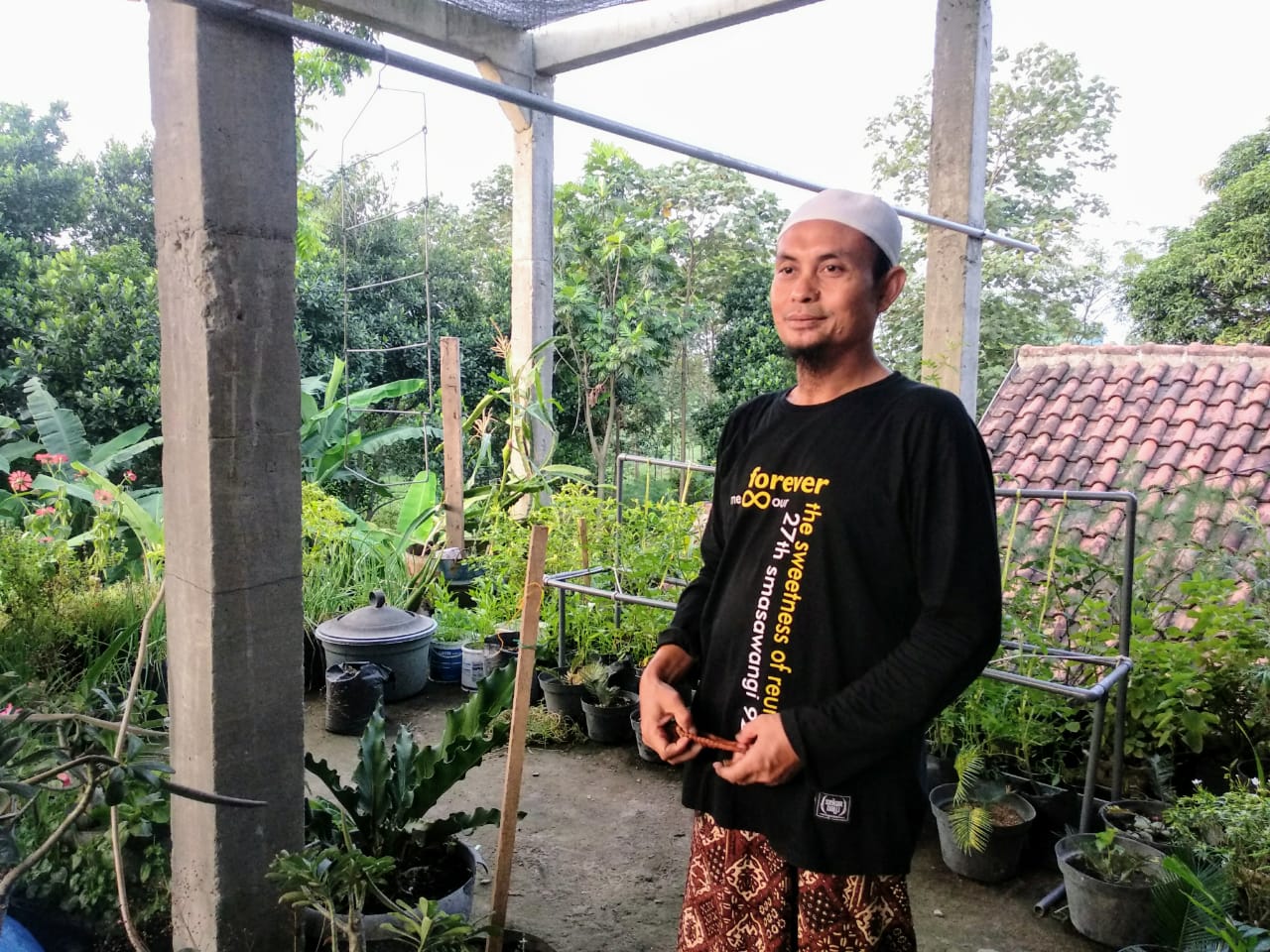 Tabib Wang saat menjelaskan proses pengobatan tradisional (Foto: M.Rizqi/Ngopibareng.id)