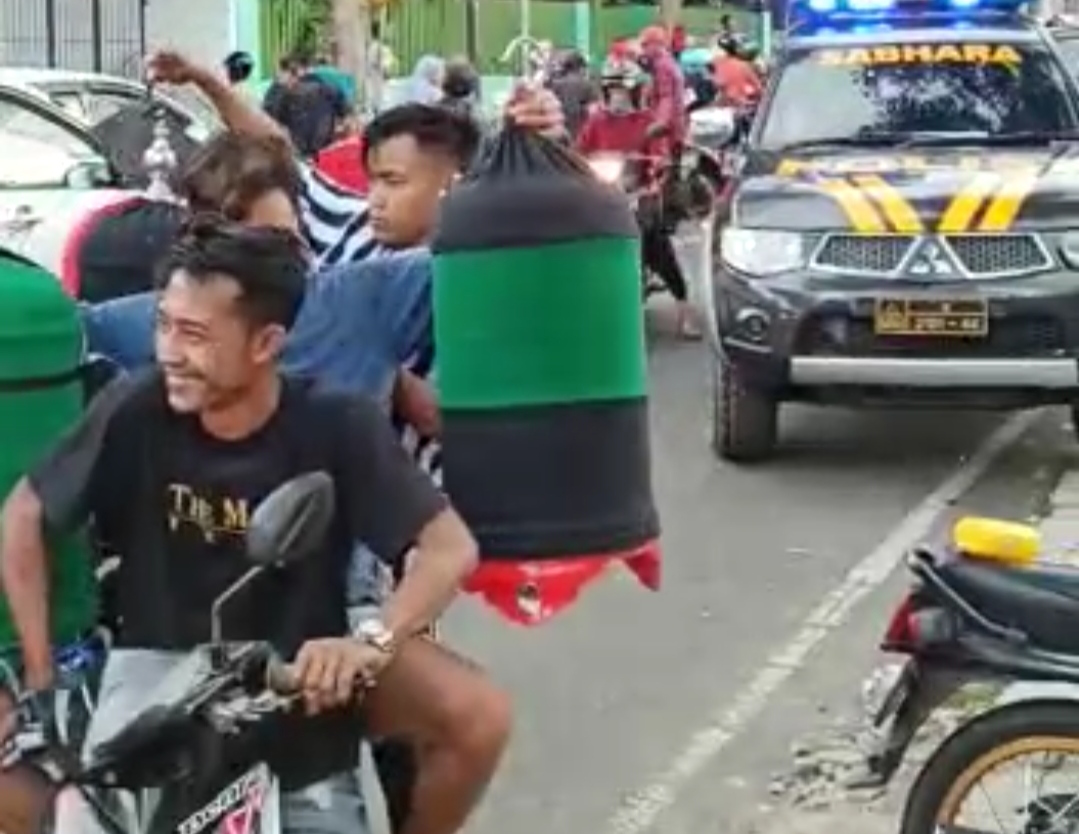 Tangkapan layar video pembubaran arena lomba burung berkicau.