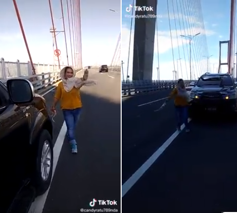 Aksi joget seorang wanita di Jembatan Suramadu, usai trio emak-emak joget di lokasi yang sama dan viral. (Foto: TikTok)