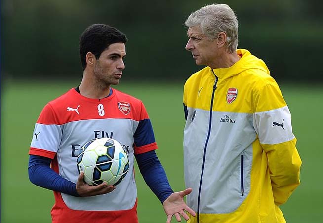 Mikel Arteta, saat masih jadi pemain Arsenal, bersama pelatih yang jadi gurunya, Arsene Wenger. (Foto:Arsenal))