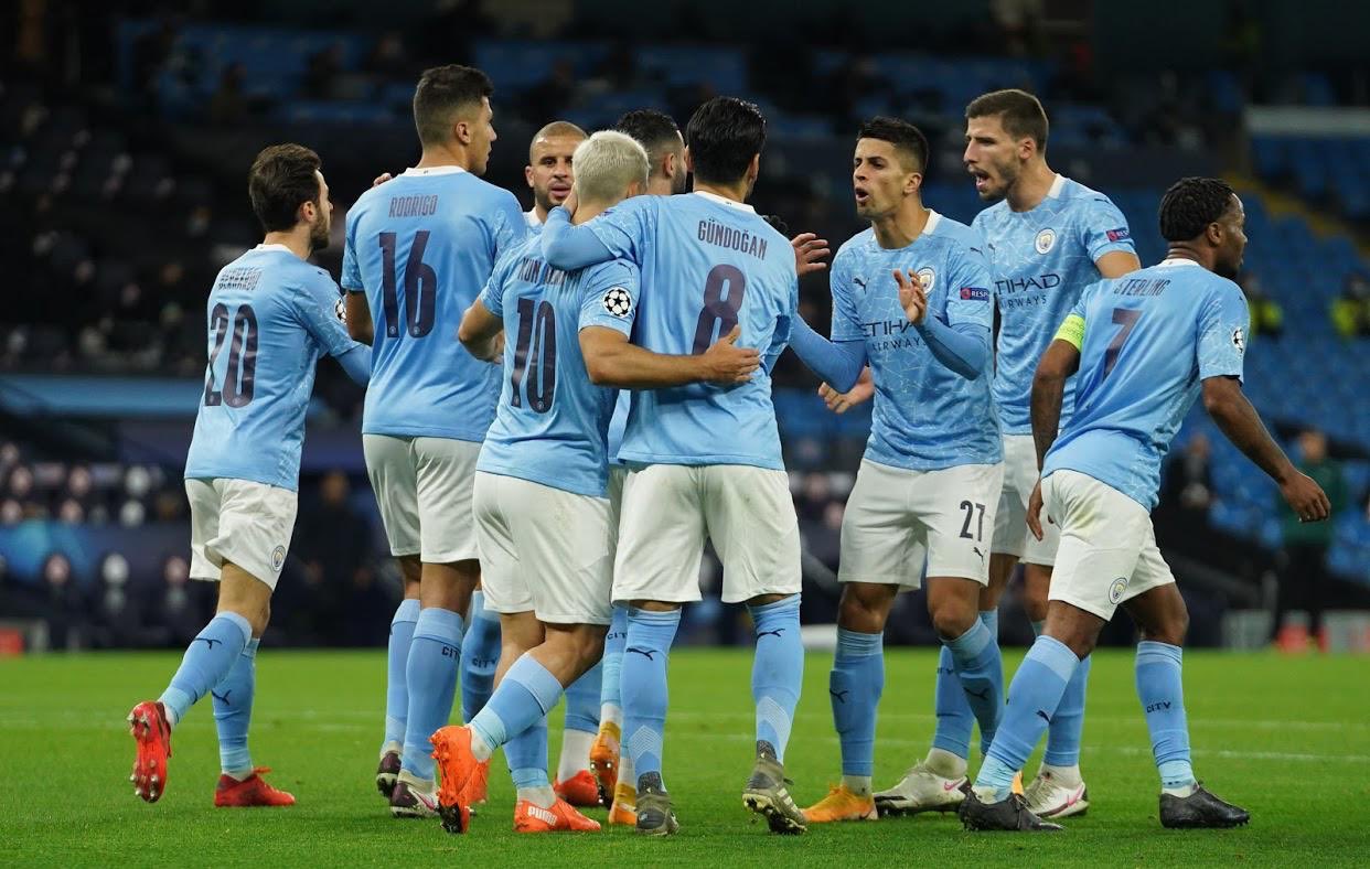 Para pemain melakukan selebrasi saat City kalahkan FC Porto 3-1 di Liga Champions. (Foto: Twitter/@ManCity)