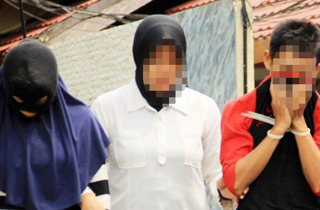 Kakak beradik tiri asal Sumenep, AD (kanan) dan YF (kiri) terlibat jalinan cinta terlarang hingga hamil. Setelah bayinya lahir langsung dibuang di belakang puskesmas. (Foto: Dok. Polres Sumenep)