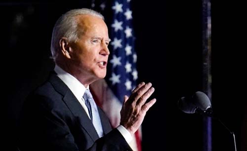 Presiden terpilih Joe Biden saat menyampaikan pidato kemenangan di Wilmington, Sabtu lalu. (Fto:AP/Aljazeera) 