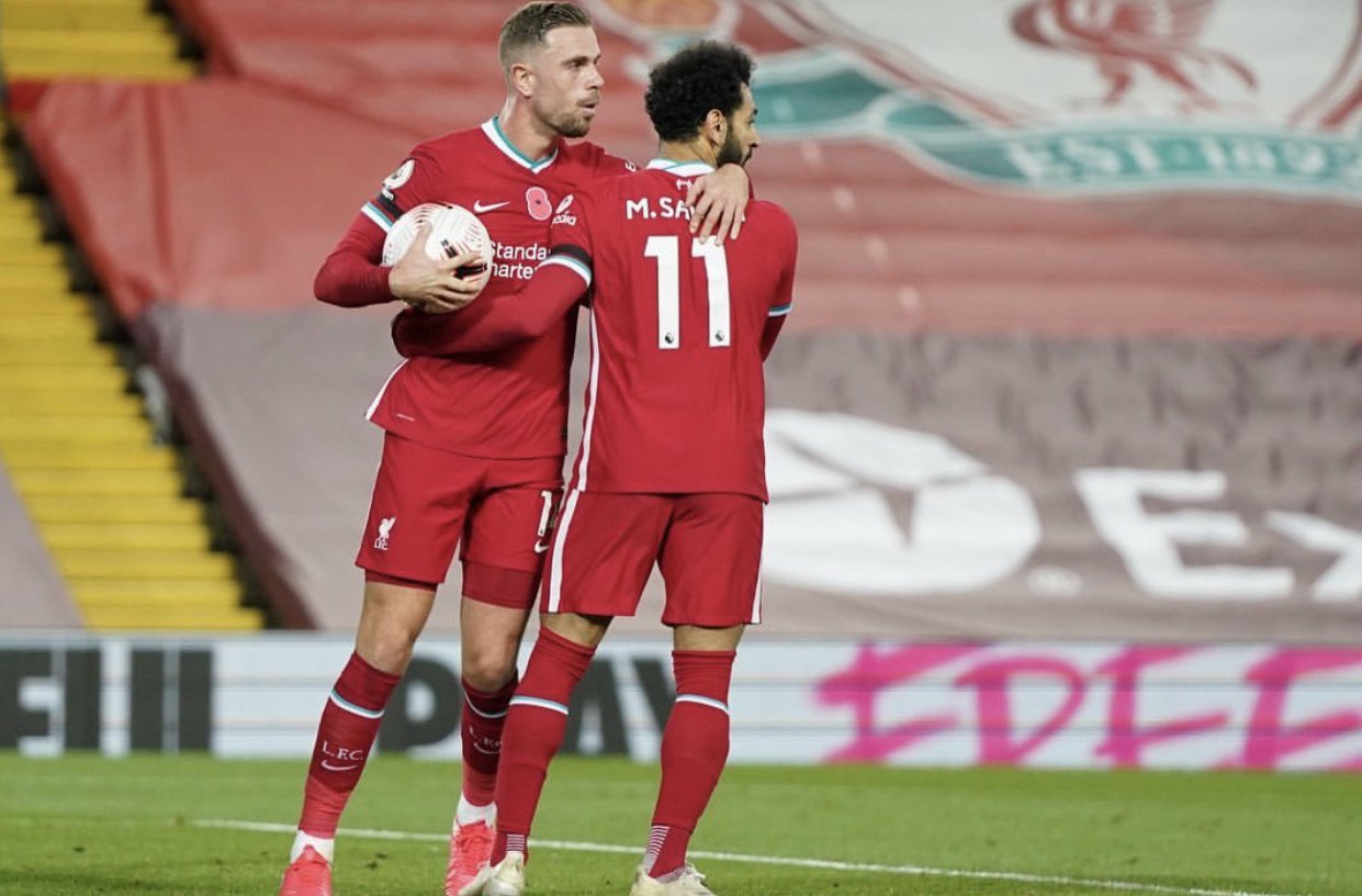 Jordan Henderson bersama Mo Salah. (Foto: Twitter/@JHenderson)