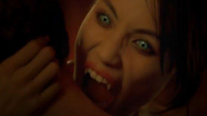 Aksi mengisap darah yang dilakukan vampir di film Vampires The Turning. (Foto: YouTube)