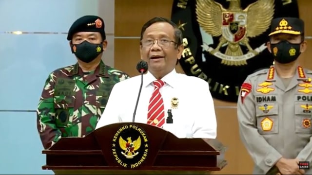 Menko Polhukam Mahfud MD saat konferensi pers membuarkan FPI. (Foto: Ant)