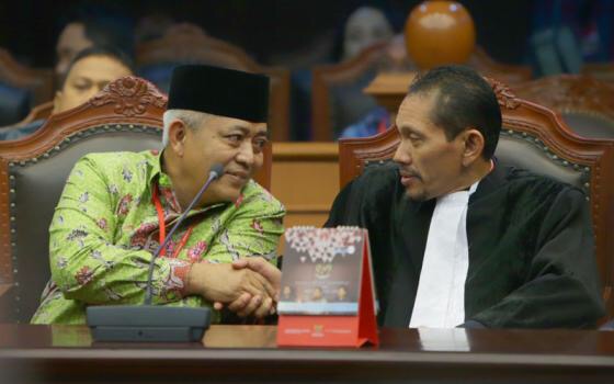 Robikin Emhas, Ketua PBNU bidang hukum